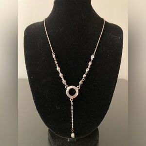 Icing necklace. Silver tone with rhinestones. Has some scratches.